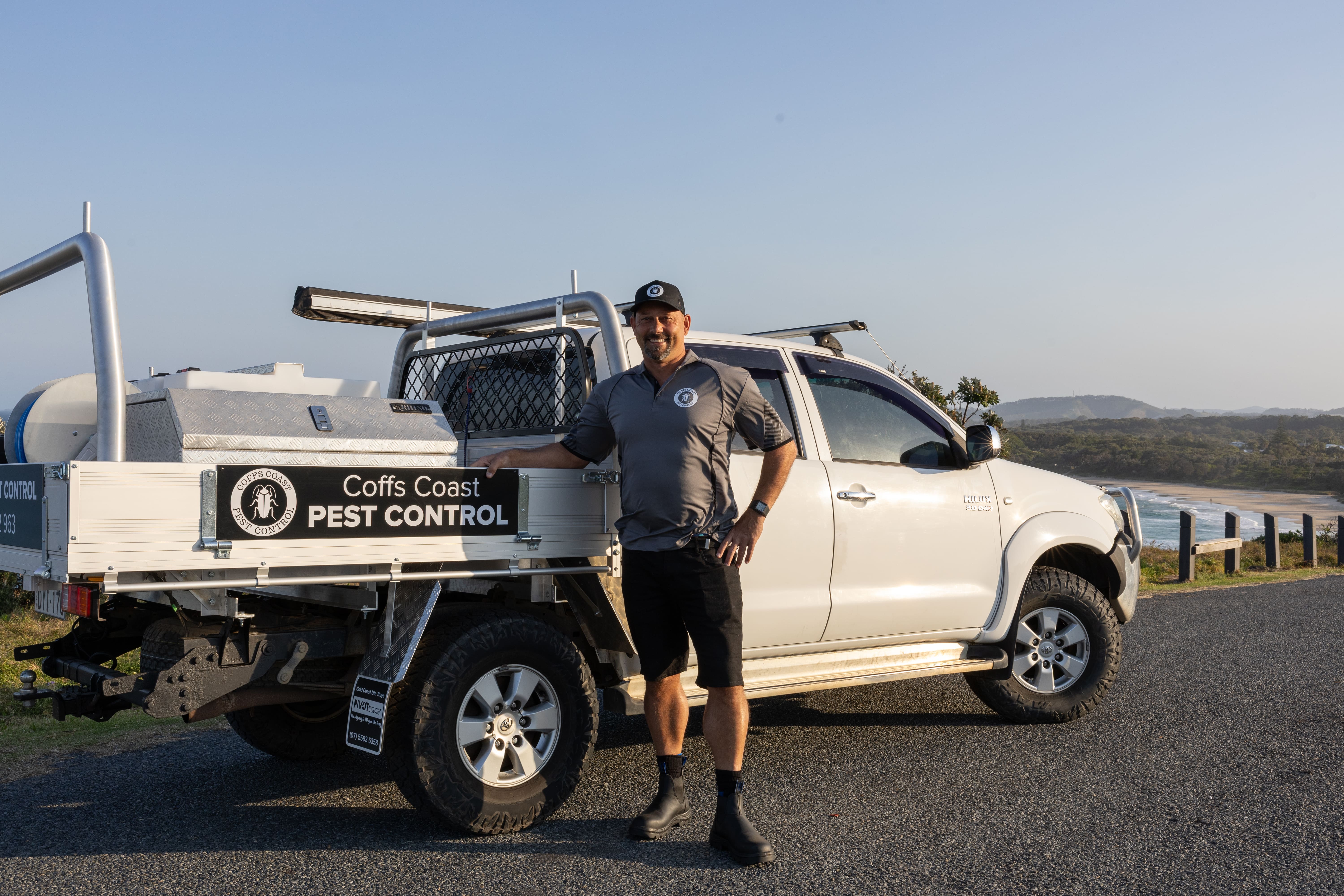 Coffs Coast Pest Control Professional with Service Vehicle